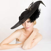 2018 collection.  black fascinator. Black hat. Kentucky Derby hat. Derby hat. Couture hat . Designer hat. Fashion hat. Red carpet hat.